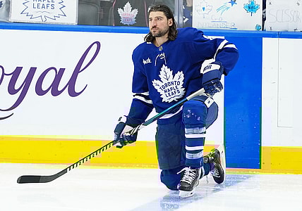 NHL: Chris Tanev, Toronto Maple Leafs defenseman, kneels on one knee