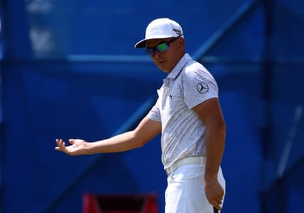 Aug 12, 2021; Greensboro, North Carolina, USA; Rickie Fowler reacts to a missed putt on the ninth hole during the first round of the Wyndham Championship golf tournament. Mandatory Credit: Rob Kinnan-USA TODAY Sports