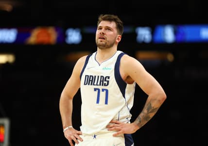 May 15, 2022; Phoenix, Arizona, USA; Dallas Mavericks guard Luka Doncic (77) against the Phoenix Suns in game seven of the second round for the 2022 NBA playoffs at Footprint Center. Mandatory Credit: Mark J. Rebilas-USA TODAY Sports