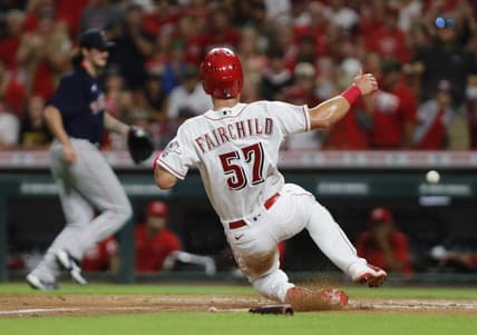 Sep 21, 2022; Cincinnati, Ohio, USA; Cincinnati Reds center fielder Stuart Fairchild (57) scores against the Boston Red Sox during the third inning at Great American Ball Park. Mandatory Credit: David Kohl-USA TODAY Sports
