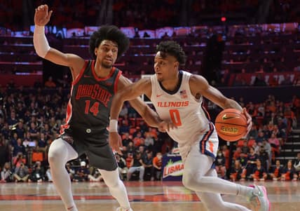 Jan 24, 2023; Champaign, Illinois, USA; Illinois Fighting Illini guard Terrence Shannon Jr. (0) drives the ball against Ohio State Buckeyes forward Justice Sueing (14) during the first half at State Farm Center. Mandatory Credit: Ron Johnson-USA TODAY Sports