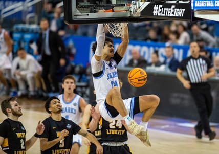 Nova Southeastern's RJ Sunahara (13) dunks the ball as the Nova Southeastern University Sharks play the West Liberty Hilltoppers during the championship game of the 2023 NCAA Division II Men   s basketball tournament at Ford Center in Downtown Evansville, Ind., Saturday afternoon, March 25, 2023.

Mb Ncaadii Championship 02