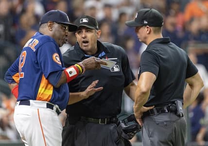 Jul 26, 2023; Houston, Texas, USA;Houston Astros manager Dusty Baker Jr. (12) argues with home plate umpire Mark Ripperger after Houston Astros catcher Martin Maldonado (15) ws ejected from the game in the fifth inning at Minute Maid Park. Mandatory Credit: Thomas Shea-USA TODAY Sports