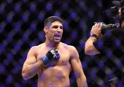 Aug 7, 2021; Houston, Texas, USA; Vicente Luque (blue gloves) reacts to the fight against Michael Chiesa (red gloves) during UFC 265 at Toyota Center. Mandatory Credit: Troy Taormina-USA TODAY Sports