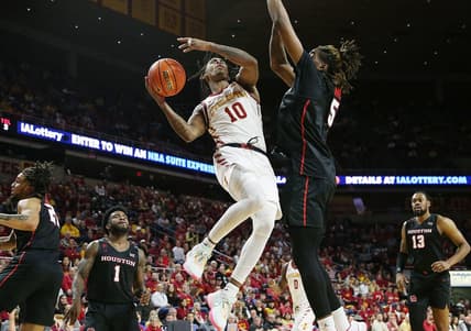 Iowa State Cyclones guard Keshon Gilbert (10) takes a shot around Houston Cougars forward Ja'Vier Francis (5) during the second half in the Big-12 conference showdown of an NCAA college basketball at Hilton Coliseum on Tuesday, Jan. 9, 2024, in Ames, Iowa.