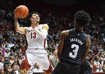 Alabama guard Jahvon Quinerly (13) makes a pass as he is defended by Texas A&M guard Quenton Jackson (3) at Coleman Coliseum Wednesday, March 2, 2022.

Alabama Vs Texas A M Sec Basketball