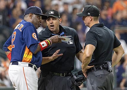 Jul 26, 2023; Houston, Texas, USA;Houston Astros manager Dusty Baker Jr. (12) argues with home plate umpire Mark Ripperger after Houston Astros catcher Martin Maldonado (15) ws ejected from the game in the fifth inning at Minute Maid Park. Mandatory Credit: Thomas Shea-USA TODAY Sports