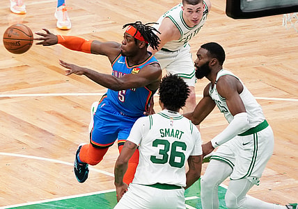Apr 27, 2021; Boston, Massachusetts, USA; Oklahoma City Thunder forward Luguentz Dort (5) passes the ball against the Boston Celtics in the second quarter at TD Garden. Mandatory Credit: David Butler II-USA TODAY Sports