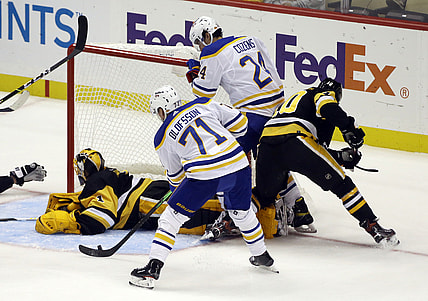 Oct 5, 2021; Pittsburgh, Pennsylvania, USA; Buffalo Sabres right wing Victor Olofsson (71) scores a goal against Pittsburgh Penguins goaltender Casey DeSmith (1) during the second period at PPG Paints Arena. Mandatory Credit: Charles LeClaire-USA TODAY Sports