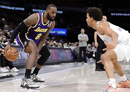 Dec 10, 2021; Oklahoma City, Oklahoma, USA; Oklahoma City Thunder forward Jeremiah Robinson-Earl (50) defends Los Angeles Lakers forward LeBron James (6) during the second quarter at Paycom Center. Mandatory Credit: Alonzo Adams-USA TODAY Sports