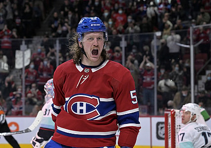 Mar 12, 2022; Montreal, Quebec, CAN; Montreal Canadiens forward Michael Pezzetta (55) reacts after scoring a goal against Seattle Kraken goalie Philipp Grubauer (31) during the first period at the Bell Centre. Mandatory Credit: Eric Bolte-USA TODAY Sports