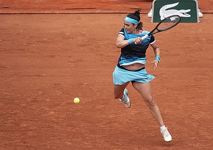 May 22, 2022; Paris, France;  Ons Jabeur (TUN) returns the ball during her match against Magda Linette (POL) on day one of the French Open at Stade Roland-Garros. Mandatory Credit: Susan Mullane-USA TODAY Sports