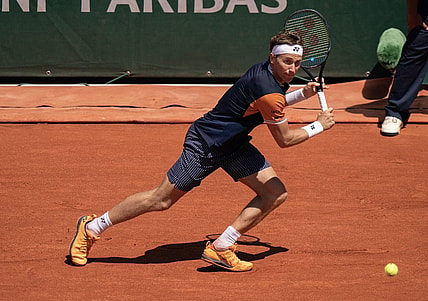 Jun 3, 2023; Paris,France; Casper Ruud (NOR) returns a shot during his match against Zhizhen Zhang (CHN) on day seven at Stade Roland-Garros. Mandatory Credit: Susan Mullane-USA TODAY Sports