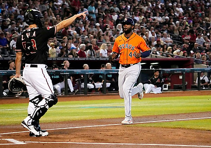 Oct 1, 2023; Phoenix, AZ, USA; Houston Astros Yordan Alvarez (44) scores on an error by the Arizona Diamondbacks in the first inning at Chase Field. Mandatory Credit: Rob Schumacher-Arizona Republic