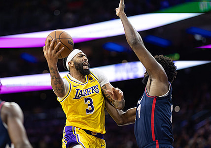 Nov 27, 2023; Philadelphia, Pennsylvania, USA; Los Angeles Lakers forward Anthony Davis (3) drives for a shot against Philadelphia 76ers center Joel Embiid (21) during the second quarter at Wells Fargo Center. Mandatory Credit: Bill Streicher-USA TODAY Sports