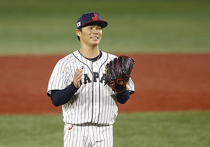 Aug 4, 2021; Yokohama, Japan; Team Japan pitcher Yoshinobu Yamamoto (17) reacts against Korea in a baseball semifinal match during the Tokyo 2020 Olympic Summer Games at Yokohama Baseball Stadium. Mandatory Credit: Yukihito Taguchi-USA TODAY Sports