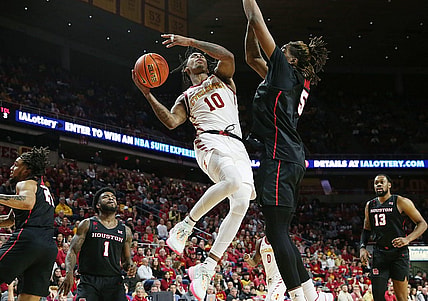 Iowa State Cyclones guard Keshon Gilbert (10) takes a shot around Houston Cougars forward Ja'Vier Francis (5) during the second half in the Big-12 conference showdown of an NCAA college basketball at Hilton Coliseum on Tuesday, Jan. 9, 2024, in Ames, Iowa.