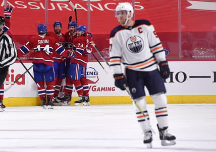 Apr 5, 2021; Montreal, Quebec, CAN; Montreal Canadiens forward Eric Staal (21) reacts with teammates including defenseman Jeff Petry (26) and forward Tyler Toffoli (73) and forward Nick Suzuki (14) after scoring the winning goal against the Edmonton Oilers during the overtime period at the Bell Centre. Mandatory Credit: Eric Bolte-USA TODAY Sports