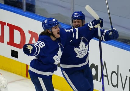 May 20, 2021; Toronto, Ontario, CAN; Toronto Maple Leafs forward William Nylander (88) celebrates his goal with forward Jason Spezza (19) against the Montreal Canadiens during the second period of game one of the first round of the 2021 Stanley Cup Playoffs at Scotiabank Arena. Mandatory Credit: John E. Sokolowski-USA TODAY Sports
