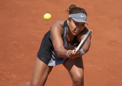 May 30, 2021; Paris, France; Naomi Osaka (JPN) in action during her match against Patricia Maria Tig (ROU) at Roland Garros Stadium. Mandatory Credit: Susan Mullane-USA TODAY Sports