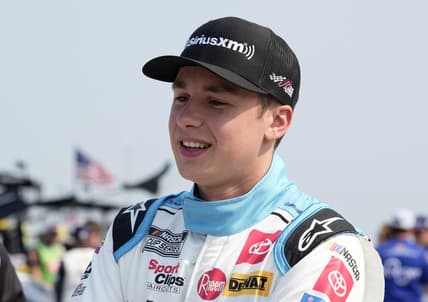Jul 4, 2021; Elkhart Lake, Wisconsin, USA; NASCAR Cup Series driver Christopher Bell (20) before the Jockey Made in America 250 Presented by Kwik Trip at Road America. Mandatory Credit: Mike Dinovo-USA TODAY Sports