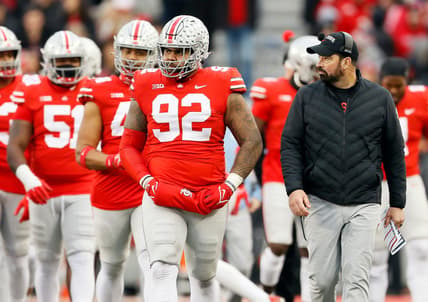 Ohio State Buckeyes defensive tackle Haskell Garrett (92) walks beside head coach Ryan Day during the third quarter of the NCAA football game at Ohio Stadium in Columbus on Saturday, Nov. 20, 2021.

Michigan State Spartans At Ohio State Buckeyes Football