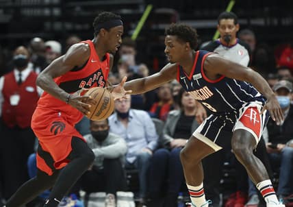 Feb 10, 2022; Houston, Texas, USA; Toronto Raptors forward Pascal Siakam (43) controls the ball as Houston Rockets forward Jae'Sean Tate (8) defends during the second quarter at Toyota Center. Mandatory Credit: Troy Taormina-USA TODAY Sports