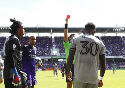 Feb 27, 2022; Orlando, Florida, USA; CF Montr  al forward Romell Quioto (30) gets called for a red card as he shoves Orlando City SC defender Robin Jansson (6) (not pictured) during the second half at Orlando City Stadium. Mandatory Credit: Kim Klement-USA TODAY Sports