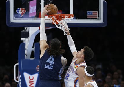 Mar 13, 2022; Oklahoma City, Oklahoma, USA; Memphis Grizzlies center Steven Adams (4) dunks as Oklahoma City Thunder forward Isaiah Roby (22) defends during the first quarter at Paycom Center. Mandatory Credit: Alonzo Adams-USA TODAY Sports
