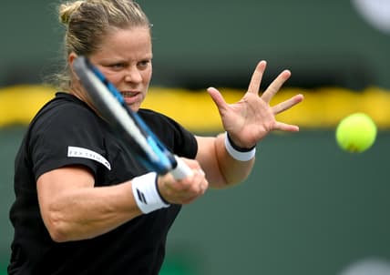 Oct 7, 2021; Indian Wells, CA, USA; Kim Clijsters (BEL) hits a shot in her first round match against Katerina Siniakova (CZE) in the BNP Paribas Open at the Indian Wells Tennis Garden. Mandatory Credit: Jayne Kamin-Oncea-USA TODAY Sports