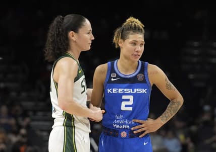 Aug 12, 2021; Phoenix, Arizona, USA; Seattle Storm guard Sue Bird (10) and Connecticut Sun guard Natisha Hiedeman (2) look on in the first half during the Inaugural WNBA Commissioners Cup Championship Game at Footprint Center. Mandatory Credit: Rick Scuteri-USA TODAY Sports