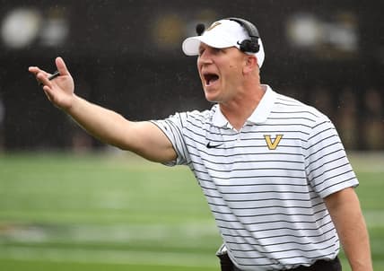Sep 10, 2022; Nashville, Tennessee, USA; Vanderbilt Commodores head coach Clark Lea questions a call during the first half against the Wake Forest Demon Deacons at FirstBank Stadium. Mandatory Credit: Christopher Hanewinckel-USA TODAY Sports