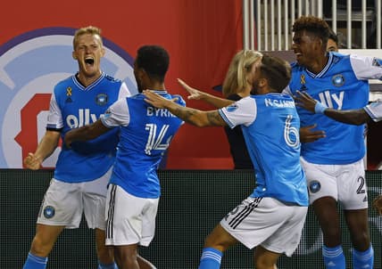 Sep 17, 2022; Chicago, Illinois, USA; Charlotte FC forward Karol Swiderski (11) reacts after scoring the winning goal against the Chicago Fire during the second half at Soldier Field. Mandatory Credit: Mike Dinovo-USA TODAY Sports