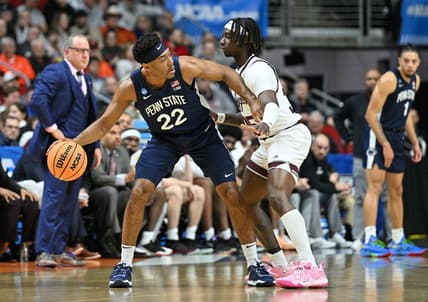 Mar 16, 2023; Des Moines, IA, USA; Penn State Nittany Lions guard Jalen Pickett (22) dribbles the ball against Texas A&M Aggies guard Manny Obaseki (35) during the first half at Wells Fargo Arena. Mandatory Credit: Jeffrey Becker-USA TODAY Sports