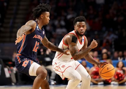 Mar 18, 2023; Birmingham, AL, USA; Houston Cougars guard Jamal Shead (1) dribbles against Auburn Tigers guard Zep Jasper (12) during the first half at Legacy Arena. Mandatory Credit: Vasha Hunt-USA TODAY Sports