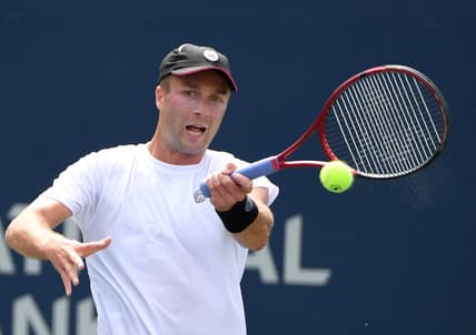Aug 8, 2021; Toronto, Ontario, Canada; Liam Broady of Great Britain plays a shot against Tommy Paul of the United States during second round qualifying for the National Bank Open. Mandatory Credit: Dan Hamilton-USA TODAY Sports