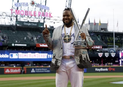 Jul 10, 2023; Seattle, Washington, USA; Toronto Blue Jays first baseman Vladimir Guerrero Jr. (27) celebrates after winning the All-Star Home Run Derby at T-Mobile Park.  Mandatory Credit: Joe Nicholson-USA TODAY Sports