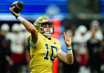 Sep 1, 2023; Atlanta, Georgia, USA; Georgia Tech Yellow Jackets quarterback Haynes King (10) passing against the Louisville Cardinals during the second half at Mercedes-Benz Stadium. Mandatory Credit: John David Mercer-USA TODAY Sports