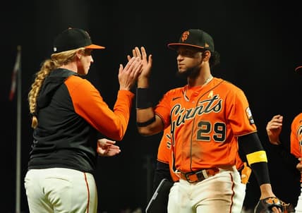 Sep 8, 2023; San Francisco, California, USA; San Francisco Giants major league coach Alyssa Nakken (92) high fives San Francisco Giants' Luis Matos (29) after a win against the Colorado Rockies at Oracle Park. Mandatory Credit: Kelley L Cox-USA TODAY Sports