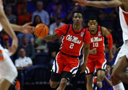 Feb 15, 2023; Gainesville, Florida, USA; Mississippi Rebels guard TJ Caldwell (2) dribbles the ball against the Florida Gators during the first half at Exactech Arena at the Stephen C. O'Connell Center. Mandatory Credit: Kim Klement-USA TODAY Sports