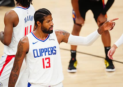 Jun 28, 2021; Phoenix, Arizona, USA; Los Angeles Clippers guard Paul George (13) against the Phoenix Suns in the first half during game five of the Western Conference Finals for the 2021 NBA Playoffs at Phoenix Suns Arena. Mandatory Credit: Mark J. Rebilas-USA TODAY Sports