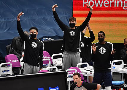 Apr 3, 2021; Washington, District of Columbia, USA; Dallas Mavericks players react on the bench during the first quarter against the Washington Wizards at Capital One Arena. Mandatory Credit: Brad Mills-USA TODAY Sports
