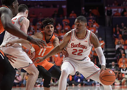 Feb 24, 2022; Champaign, Illinois, USA;  Ohio State Buckeyes guard Malaki Branham (22) drives the ball past Illinois Fighting Illini guard Alfonso Plummer (11) during the second half at State Farm Center. Mandatory Credit: Ron Johnson-USA TODAY Sports