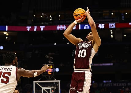 Mar 10, 2022; Tampa, FL, USA; Mississippi State Bulldogs forward Garrison Brooks (10) shoots as South Carolina Gamecocks forward Wildens Leveque (15) defends  during the second half at Amalie Arena. Mandatory Credit: Kim Klement-USA TODAY Sports