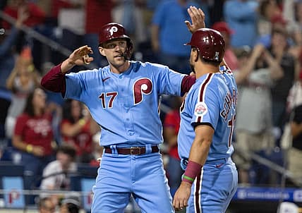 Sep 8, 2022; Philadelphia, Pennsylvania, USA; Philadelphia Phillies first baseman Rhys Hoskins (17) and left fielder Kyle Schwarber (12) celebrate after scoring against the Miami Marlins during the fifth inning at Citizens Bank Park. Mandatory Credit: Bill Streicher-USA TODAY Sports