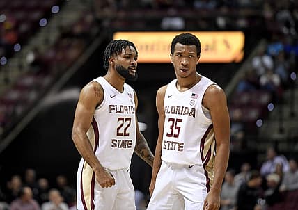 Nov 30, 2022; Tallahassee, Florida, USA; Florida State Seminoles guard Matthew Cleveland (35) and Darin Green Jr. (22) react to a play during the first half against the Purdue Boilermakers at Donald L. Tucker Center. Mandatory Credit: Melina Myers-USA TODAY Sports