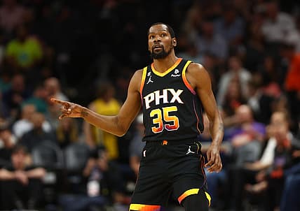 Apr 6, 2023; Phoenix, Arizona, USA; Phoenix Suns forward Kevin Durant (35) celebrates a shot against the Denver Nuggets in the first half at Footprint Center. Mandatory Credit: Mark J. Rebilas-USA TODAY Sports