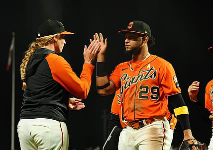 Sep 8, 2023; San Francisco, California, USA; San Francisco Giants major league coach Alyssa Nakken (92) high fives San Francisco Giants' Luis Matos (29) after a win against the Colorado Rockies at Oracle Park. Mandatory Credit: Kelley L Cox-USA TODAY Sports