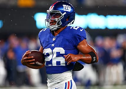 Sep 10, 2023; East Rutherford, New Jersey, USA; New York Giants running back Saquon Barkley (26) runs with the ball during warmups for their game against the Dallas Cowboys at MetLife Stadium. Mandatory Credit: Ed Mulholland-USA TODAY Sports