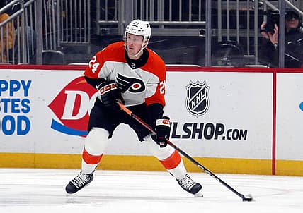 Feb 25, 2024; Pittsburgh, Pennsylvania, USA;  Philadelphia Flyers defenseman Nick Seeler (24) handles the puck against the Pittsburgh Penguins during the first period at PPG Paints Arena. Mandatory Credit: Charles LeClaire-USA TODAY Sports